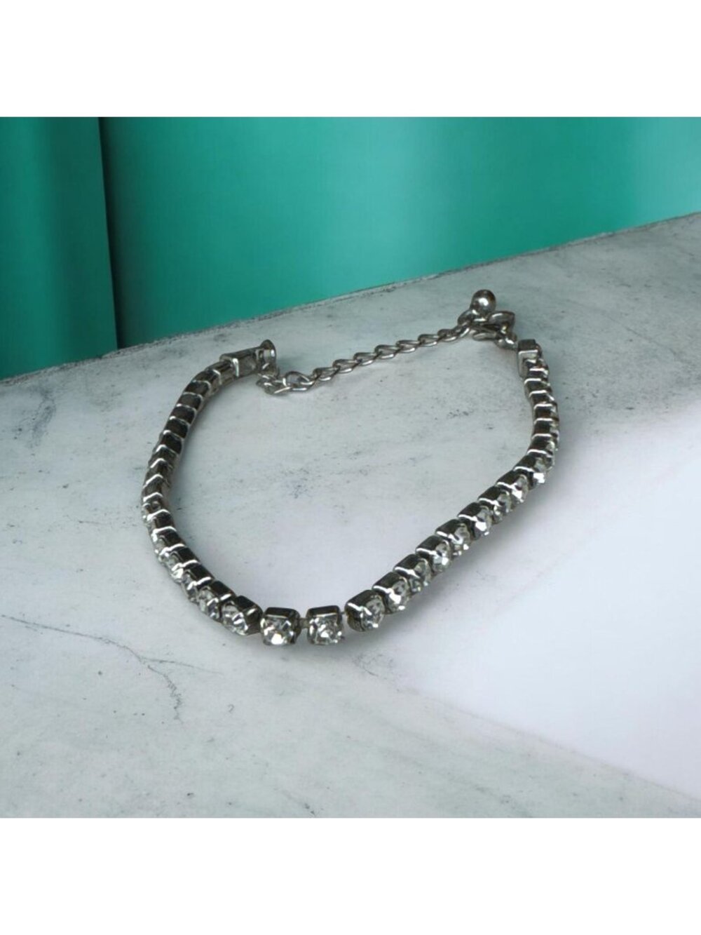 Rhinestone Tennis Bracelet With Adjustable Clasp In Silver Tone Finish